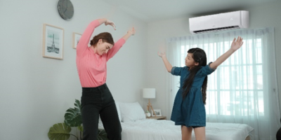 two person dancing with air conditioner